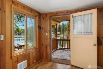 Door leading to covered deck offering stunning lake views.