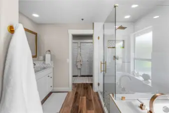 Walk-in shower and jetted tub.