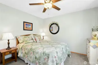 Comfort and hospitality await in this main-floor guest bedroom—perfect for friends and family to enjoy restful stays.