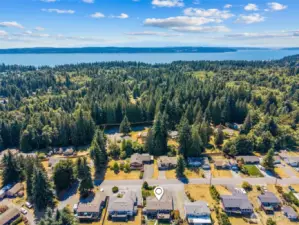 Bird’s-eye view of your island retreat. Perfectly positioned to capture the natural beauty and laid-back charm of Camano Island. Welcome home!