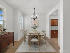 Perfect for entertaining, the formal living and dining areas are filled with natural light from large windows.