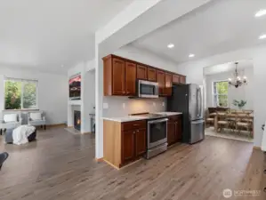 The open, spacious layout flows easily into the formal living and dining rooms, making the main level feel both inviting and connected.