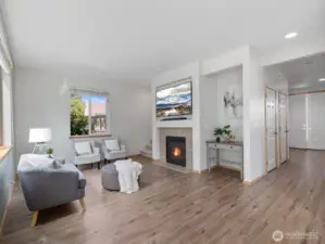 Open to the kitchen, the family room offers a comfortable retreat. Gather around the gas fireplace on chilly evenings or enjoy the natural light streaming through oversized windows during the day.