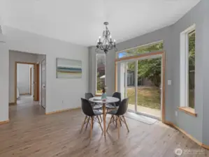 A sunny breakfast nook provides a cozy spot for casual dining, with views out to the backyard. Whether it’s morning coffee or late-night snacks, this space is both stylish and functional.
