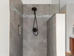 Gorgeous brand new tilework in the shower.