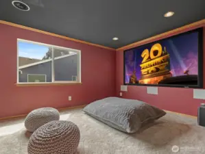 The crown jewel of this home is the professionally designed theatre room. Outfitted with a built-in projector, screen, and certified 7.2 THX Dolby surround sound system, it delivers a true cinematic experience without leaving home.