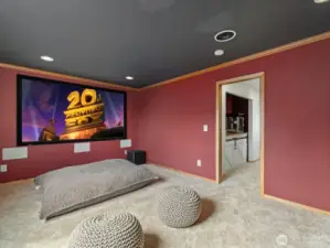 A nearby concession closet makes it easy to store snacks and drinks, so movie nights feel like a trip to the theatre.