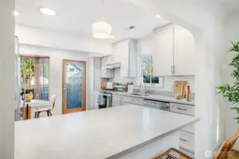 New Quartz counters and back splash, stainless steel appliance package, new cabinetry, lighting and Oak flooring.