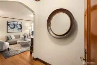 Enter unit #302 to find period details including original oak hardwoods, picture rail moulding, and coved ceilings.