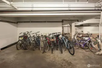 Community bike storage located in garage.