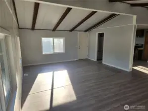 Large Living Room looking towards Kitchen and Front Door