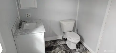 Master Bathroom highlighting spacious room around sink/toilet