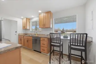 Eating nook adjoining the kitchen. New interior paint throughout.