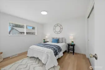 Primary bedroom with En-suite bath. New window treatments throughout.