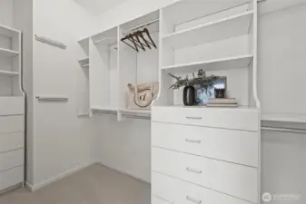 Primary bedroom walk in closet