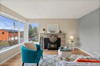 Nice wood stove insert. Large corner windows brings natural lights in