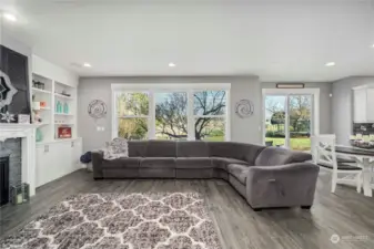 Oversized Family room with built-ins and gas fireplace.