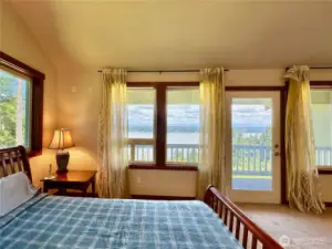 The upper primary bedroom has a deck, large walk-in closet, fireplace & full ensuite with jetted tub.