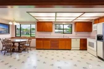 This kitchen is so big.  There is a pantry to the left of picture, and corner nook with storage area