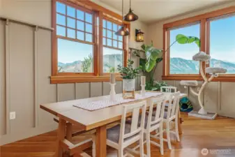 Dining area framed by stunning surrounding views—perfect for everyday meals or elegant gatherings.