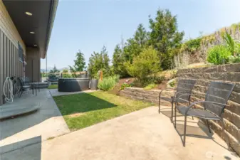 Cozy side yard offers potential for a dog run or a private outdoor spa retreat.