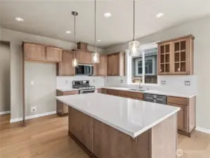 Home is under construction. Photos, including virtually staged, are of a previously bult home in a different community with similar finishes. Builder reserves the right to make changes to plans & specifications without notice. Features vary by plan. Buyer to verify square footage.