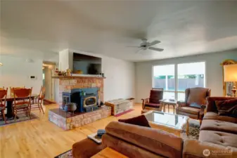 Enter into the living room with hard wood floors.