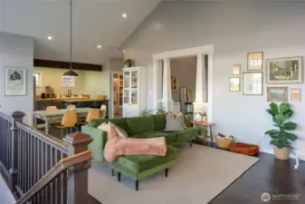 Open living/dining/kitchen on the upper floor.