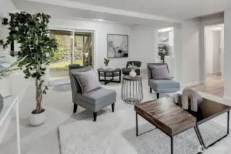 Rec room downstairs with access to back yard.