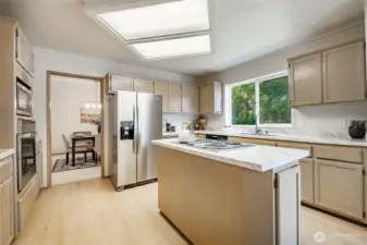 Kitchen with fresh paint, new flooring and countertops