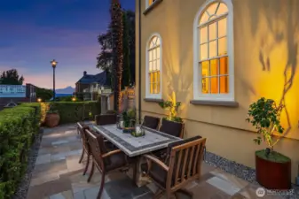 Terraced back patio on south side of home – a perfect spot for alfresco dining and entertaining. Enjoy the view of Puget Sound and the Olympic mountains!
