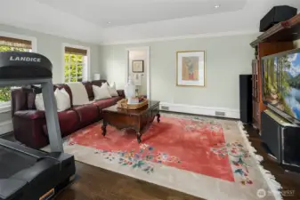 Second floor media room with en-suite full bathroom with cedar dry sauna.