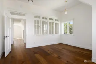 Office with amazing interior windows for light and heat thru transom.