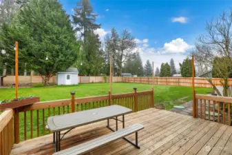 Enjoy Summer BBQ's on this wonderful deck in your oversized backyard