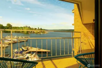 As daylight softens, unwind with golden-hour views that stretch across sky, shoreline, and still water.