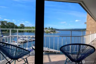 Pull up a chair and watch the marina shimmer—this is your front row to sunrise coffees and sunset conversations.