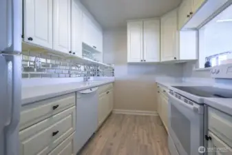 Bright, clean, and thoughtfully appointed—this kitchen balances classic design with effortless flow, perfect for morning routines, shared meals, or a quiet evening unwind.