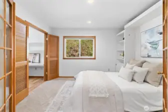 Main floor den/office with a murphy bed and walk in closet that has been converted to an office space.  Great opportunity for a main floor primary suite.