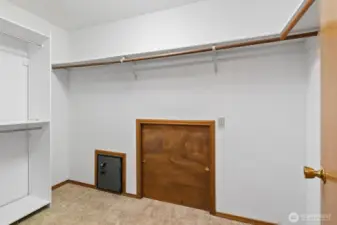 Large walk-in closet in primary bedroom.