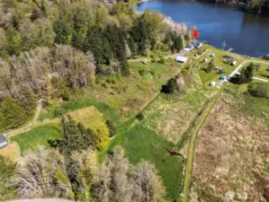 Brush and pasture area behind the home has been used in the past for horses and other livestock.  Be sure to see parcel map for boundaries.