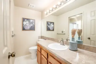 Full bathroom features brand new vinyl flooring.