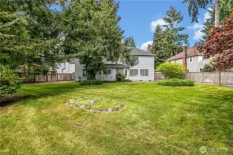 The fully fenced backyard offers privacy and security, creating a safe space for pets, children, or outdoor activities.