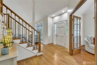 The large and inviting foyer sets the tone for the rest of the home, welcoming guests with warmth and style. Its open design offers a grand first impression.