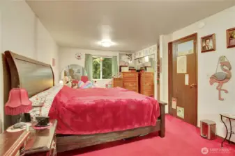 There used to be a wall down the center of the primary. There are 2 closets and 2 entry doors.