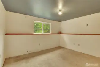 One side of the downstairs bedroom.
