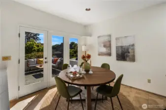 Sunken living/dining opens to sun drenched patio.