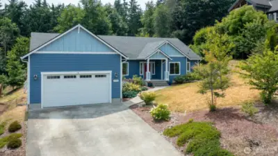 This home backs to a green belt and has trails to enjoy. Private Beach rights are a short drive away.