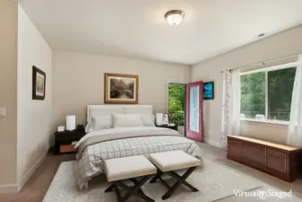 Primary Suite with door out to the patio.