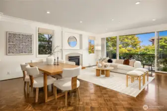 Beautiful parquet hardwood floors in the dayrooms.  High ceilings and a balcony with room for a bisto table and two chairs.  This 1400sf condo feels so much bigger!