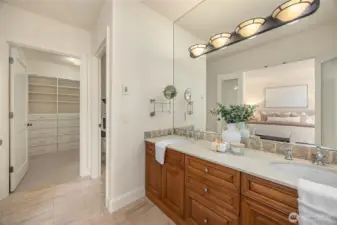 Toilet room with a door and walk-in closet.
